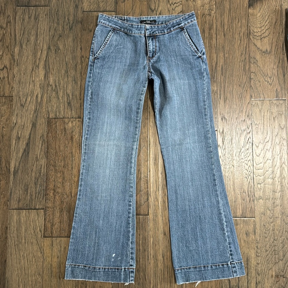 Slightly distressed wide leg jeans